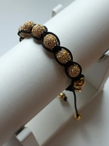 Braided gold-plated bracelet with zirconia
