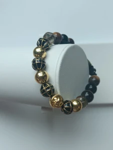 Braided bracelet with gold-plated glass