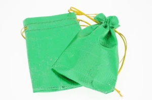 Shiny green jewelry pouch small 10x7 cm
