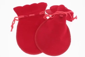 Red flocked jewelry pouch 12x8 cm